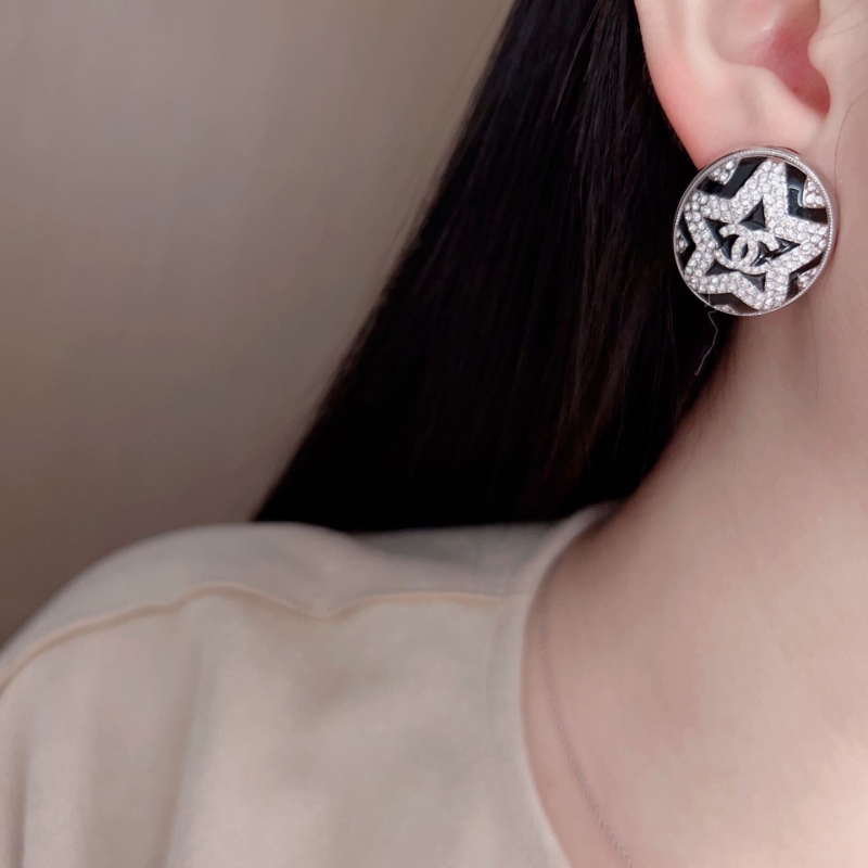 Ch*el earrings
